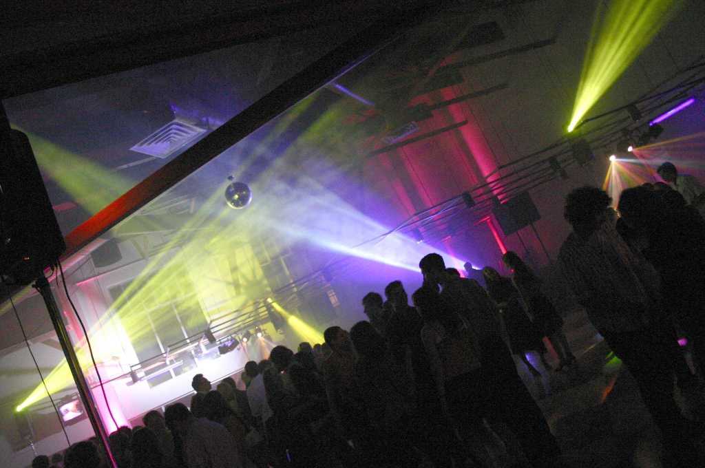 DJ at School Dance - Crowd / Lighting Shot from back of room